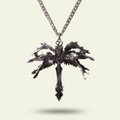 Silver necklace with a detailed pendant on a light beige background