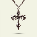 Silver cross pendant necklace on a light beige background