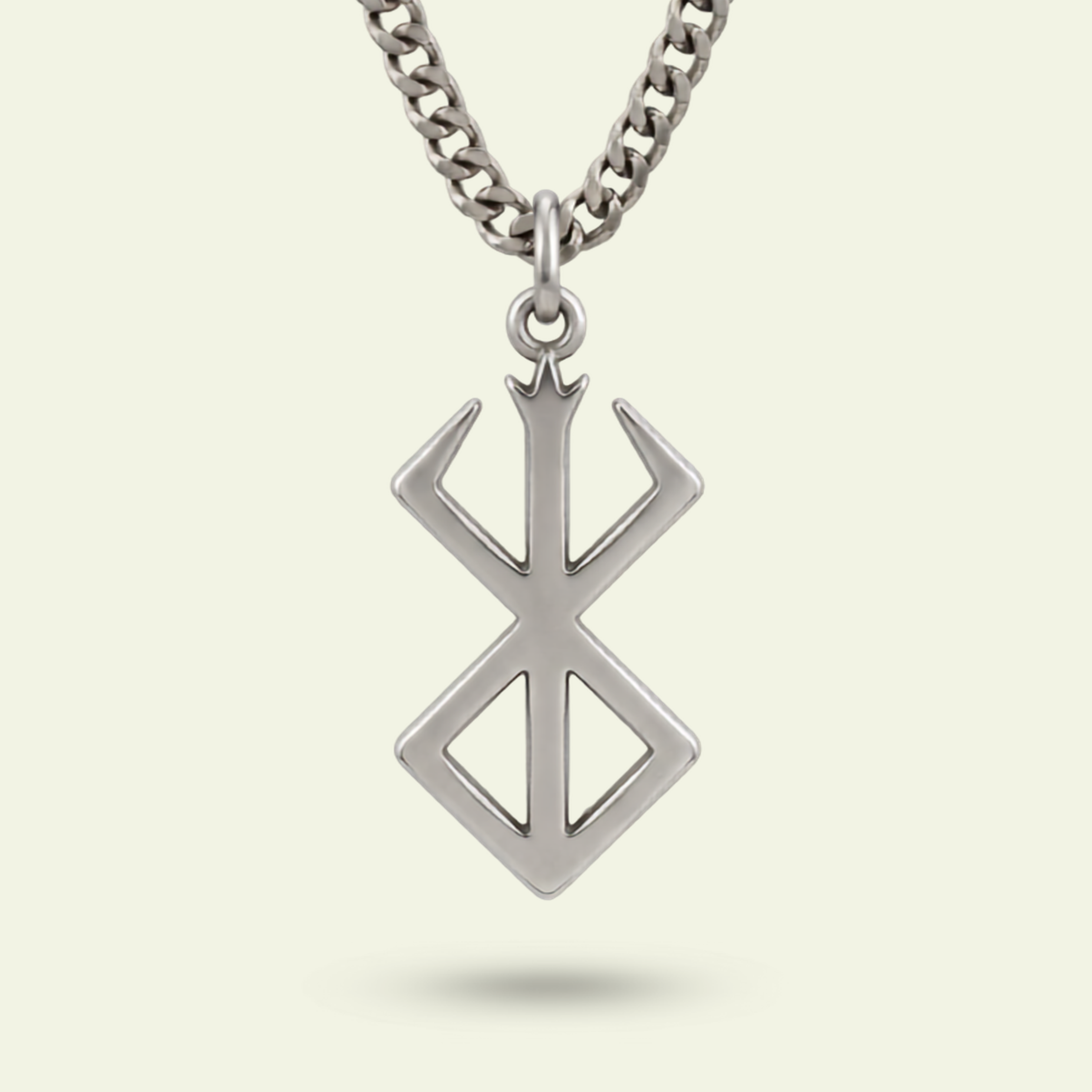 Silver necklace with a geometric pendant on a light gray background